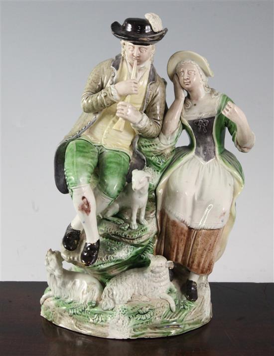 A Ralph Wood (the younger) lead-glazed group of a shepherd and shepherdess, c.1780-1800, 24.7cm, part of horn replaced and other slight